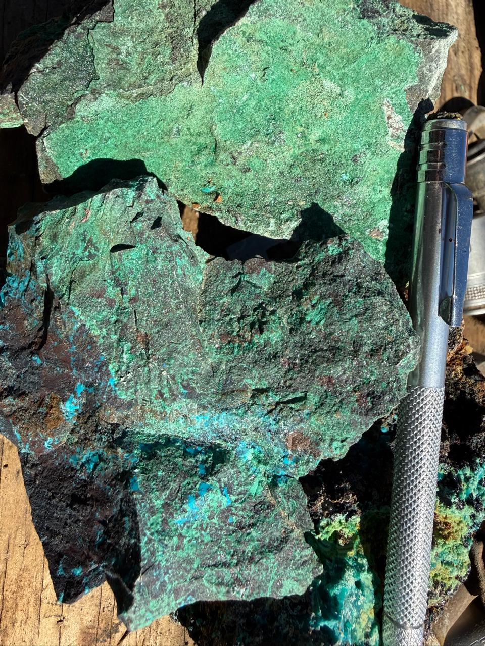 Hand sample showing malachite and chrysocolla (copper oxides)